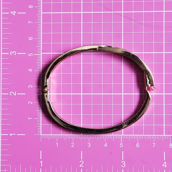 Swarovski Edith Goldtone Twist Rows Pave Hinged Bracelet - Picture 9 of 13